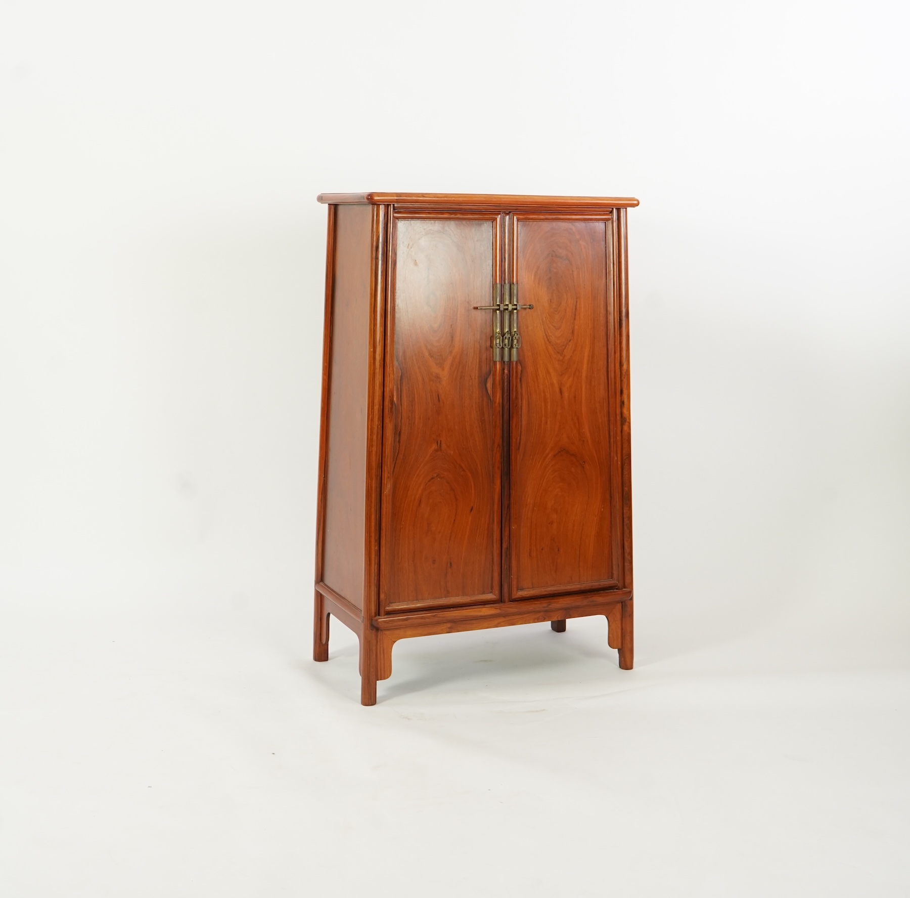 A Chinese huanghuali round-corner cabinet, yuanjiaogui, 19th/20th century
